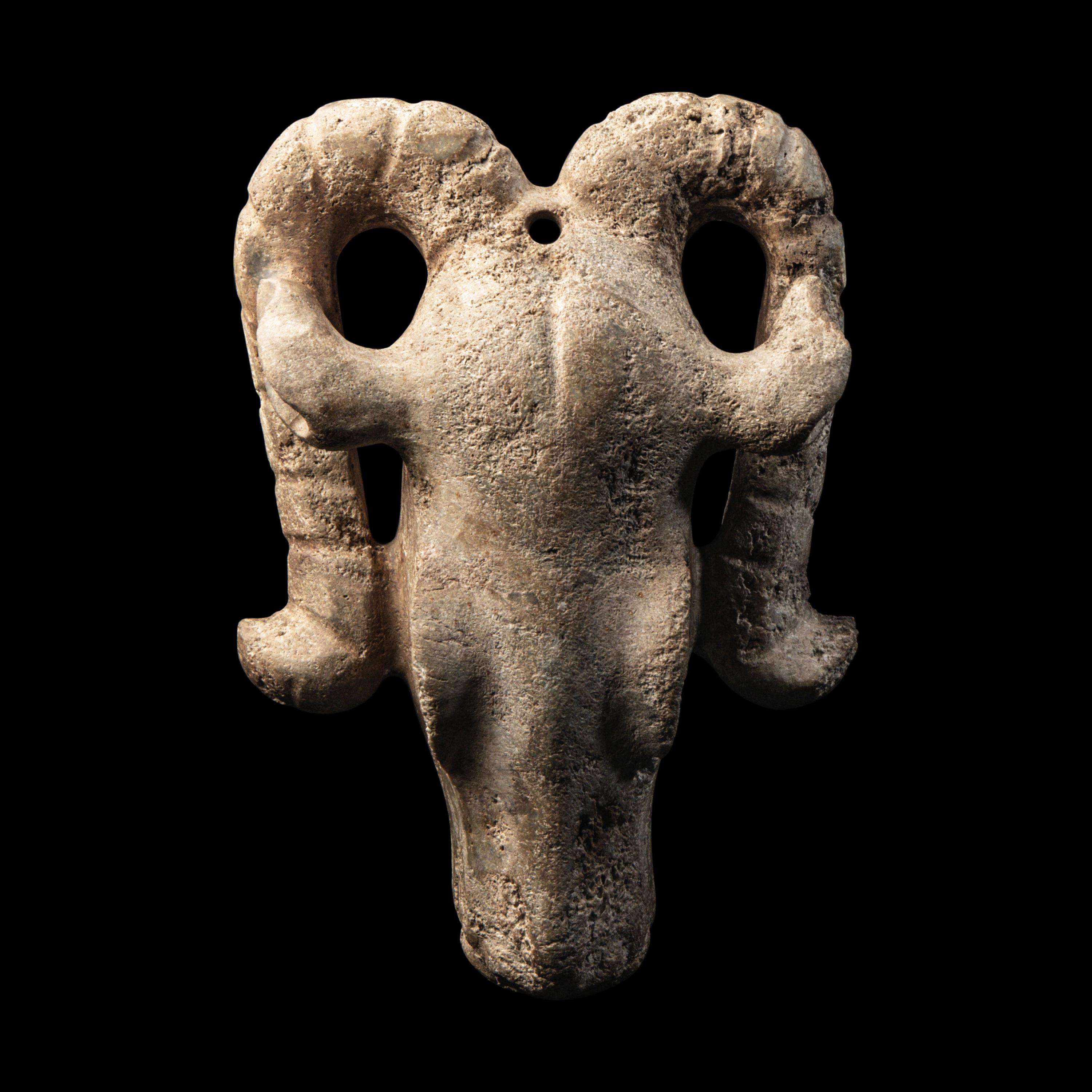 A Western Asiatic Jadeite or Serpentine Ram’s Skull