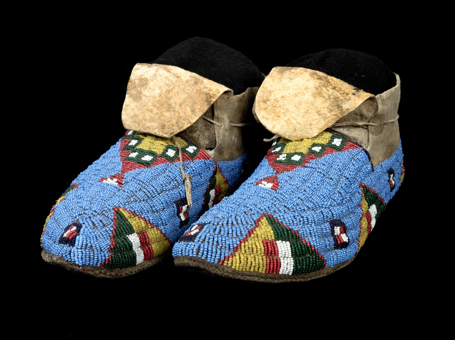 A Pair of Sioux Beaded Moccasins Length 10 inches — CIRCA 1880
