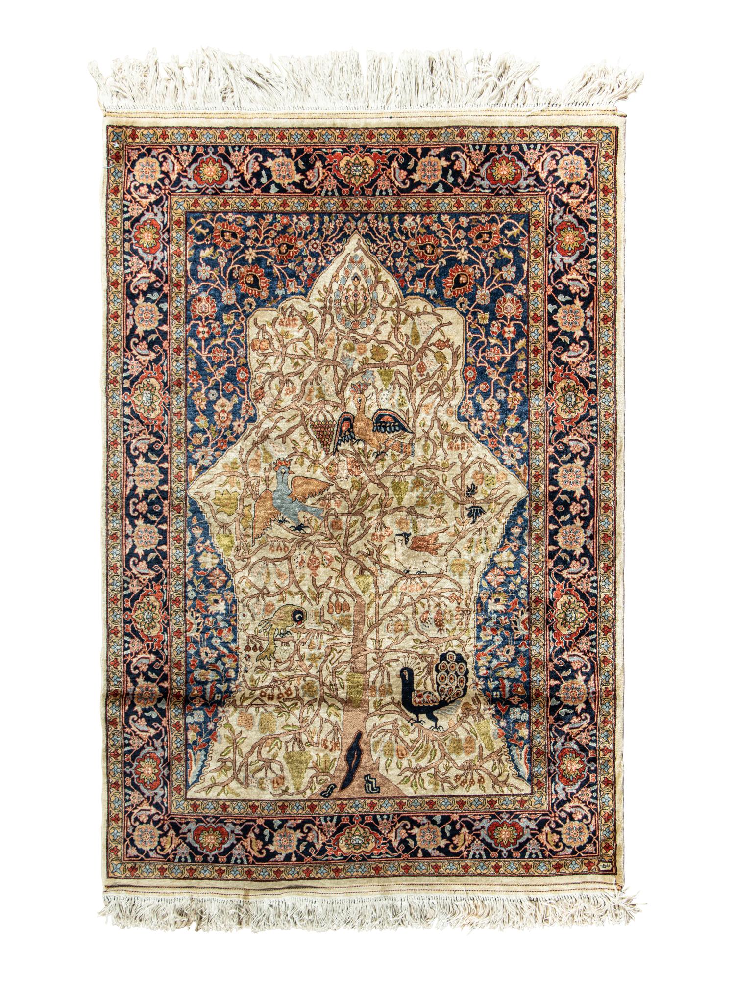 A Kashan Silk Rug