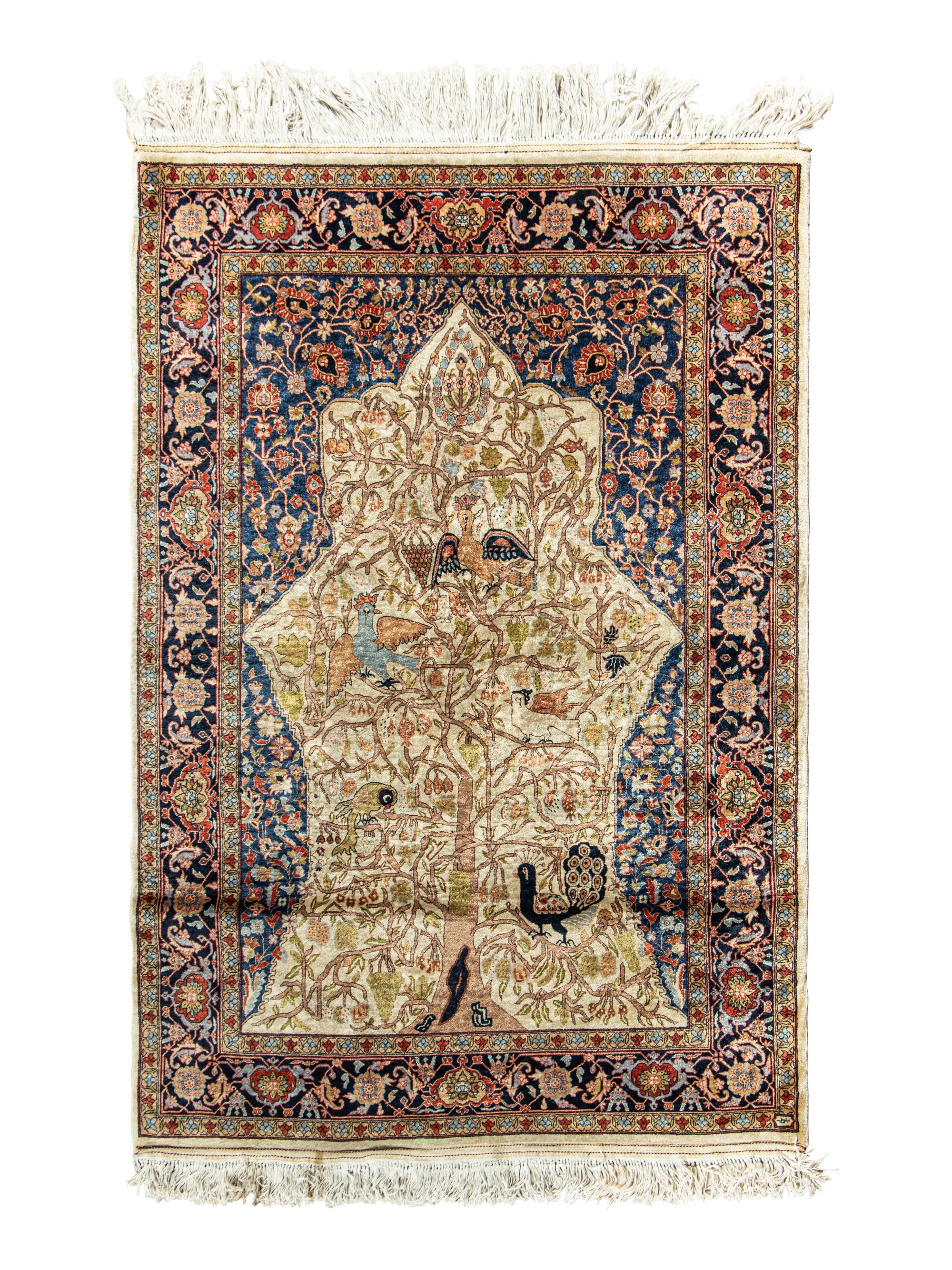 A Kashan Silk Rug