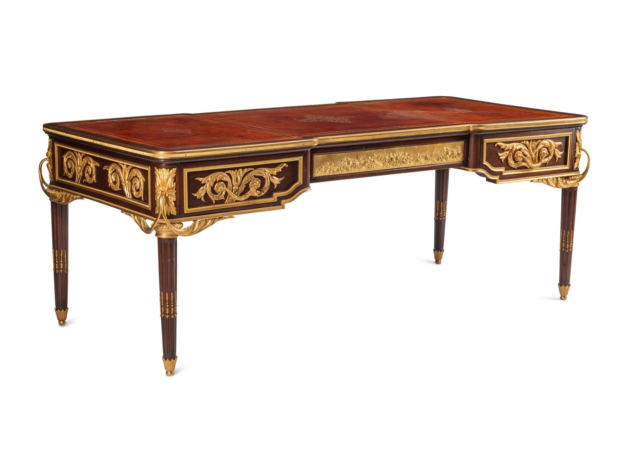 A Louis XVI Style Gilt Bronze Mounted Mahogany Bureau Plat