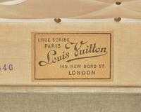 A Louis Vuitton Monogrammed Canvas Hardsided Trunk with 'JG' Monogram