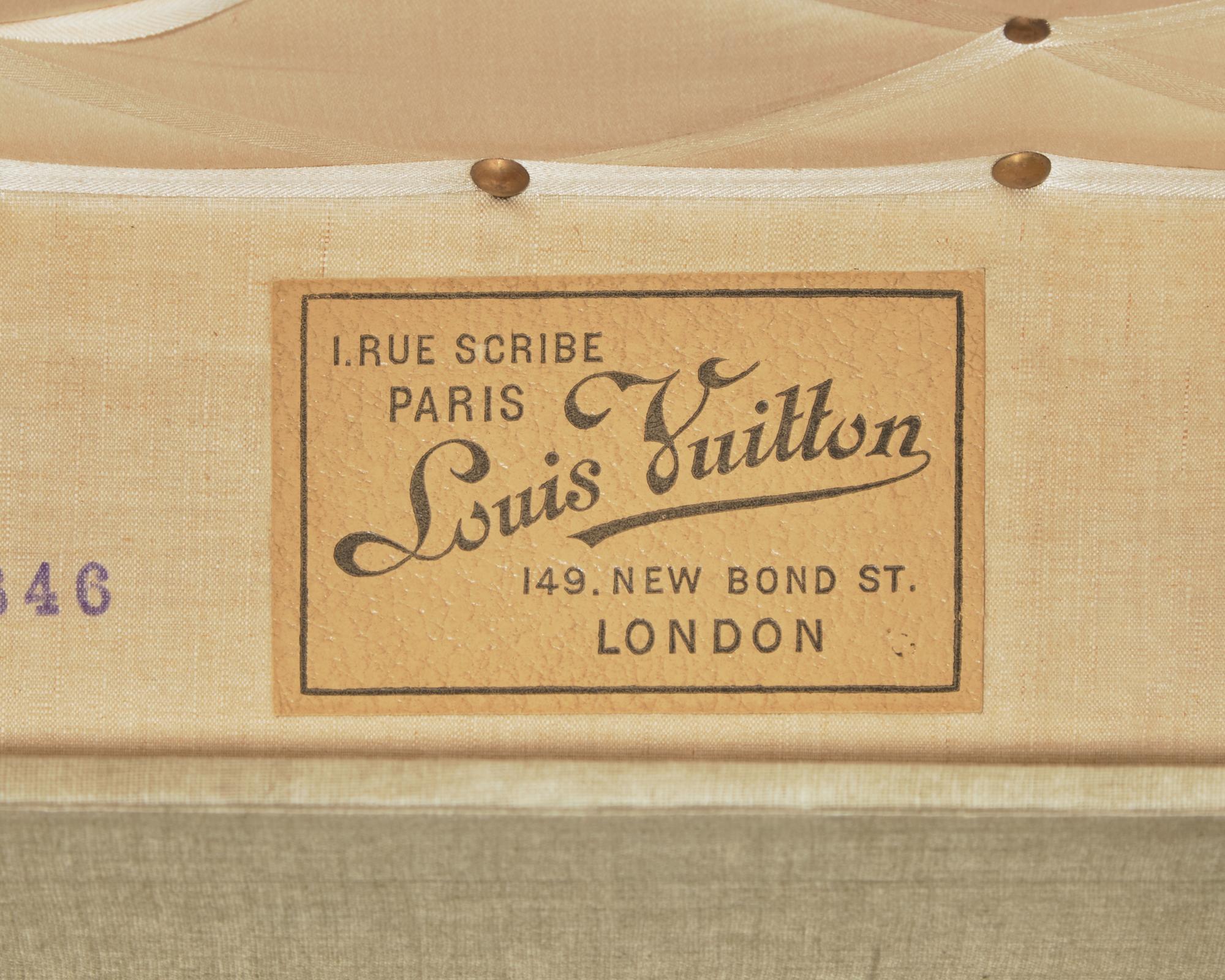 A Louis Vuitton Monogrammed Canvas Hardsided Trunk with 'JG' Monogram