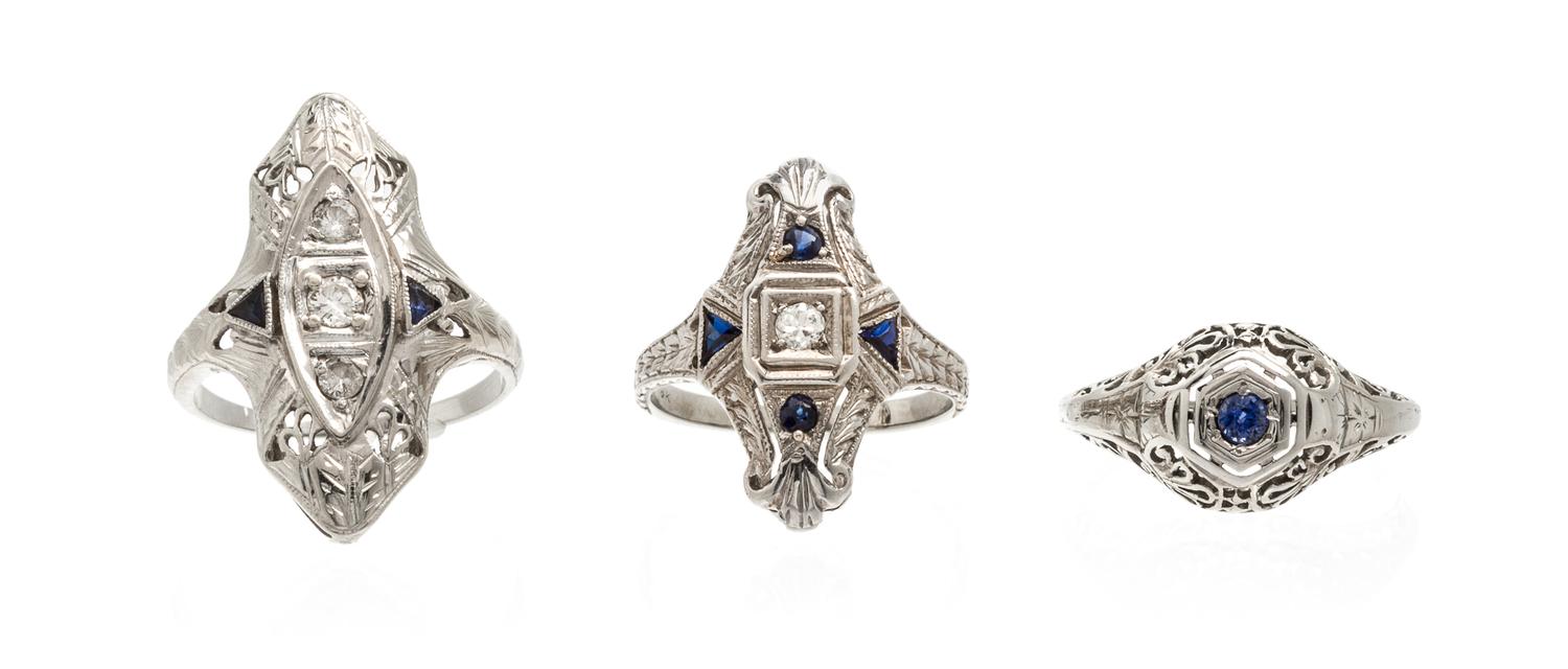 A Collection of 18 Karat White Gold, Diamond and Sapphire Rings, 5.60 dwts.