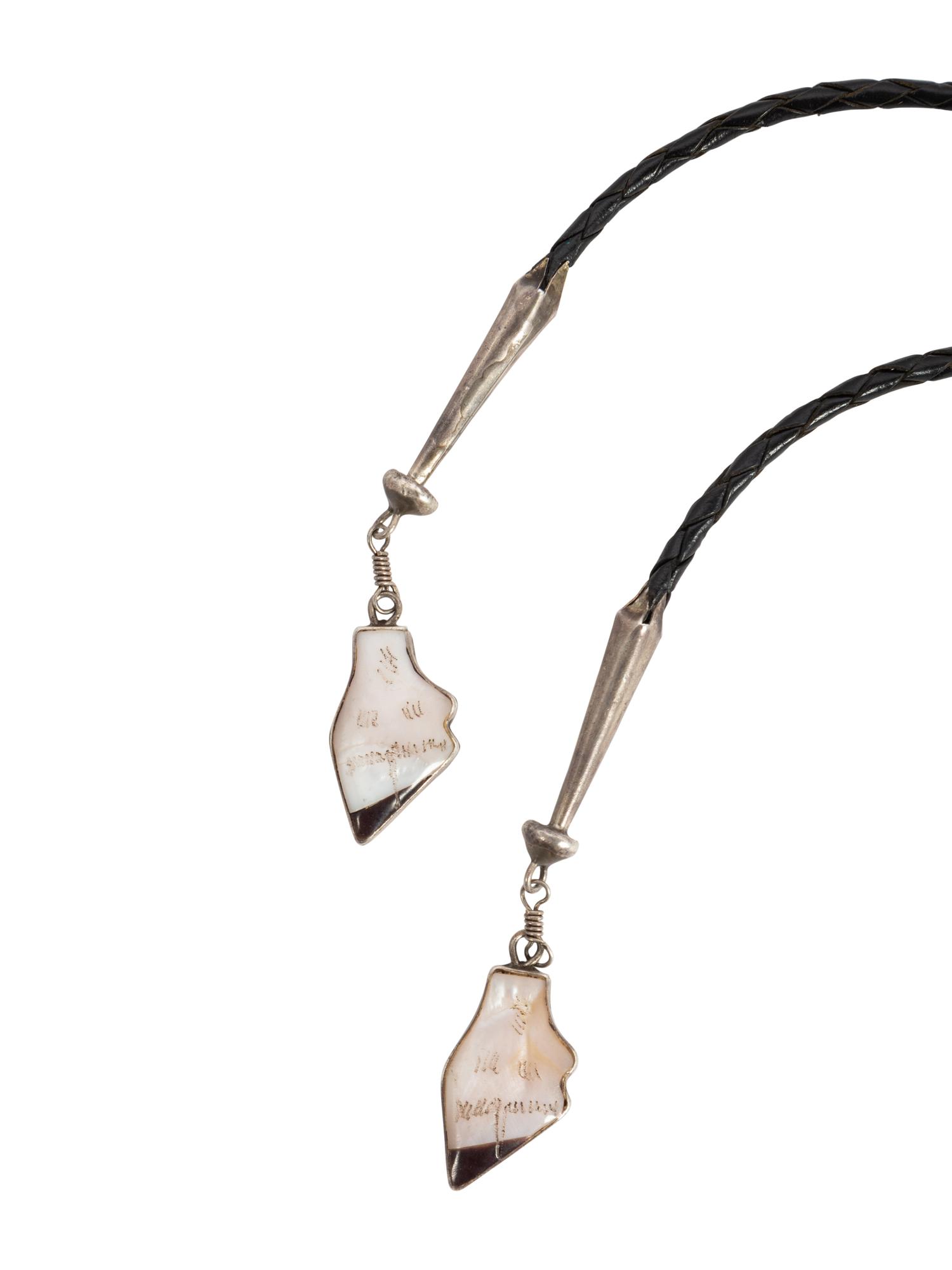 An Inlaid Silver Elk Bolo Tie by Joe Zun