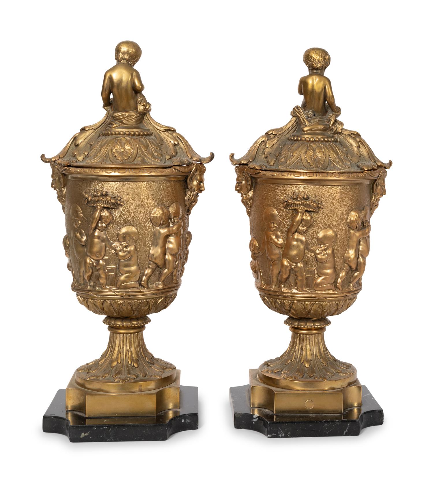 A Pair of French Gilt Bronze Ornamental Lidded Urns