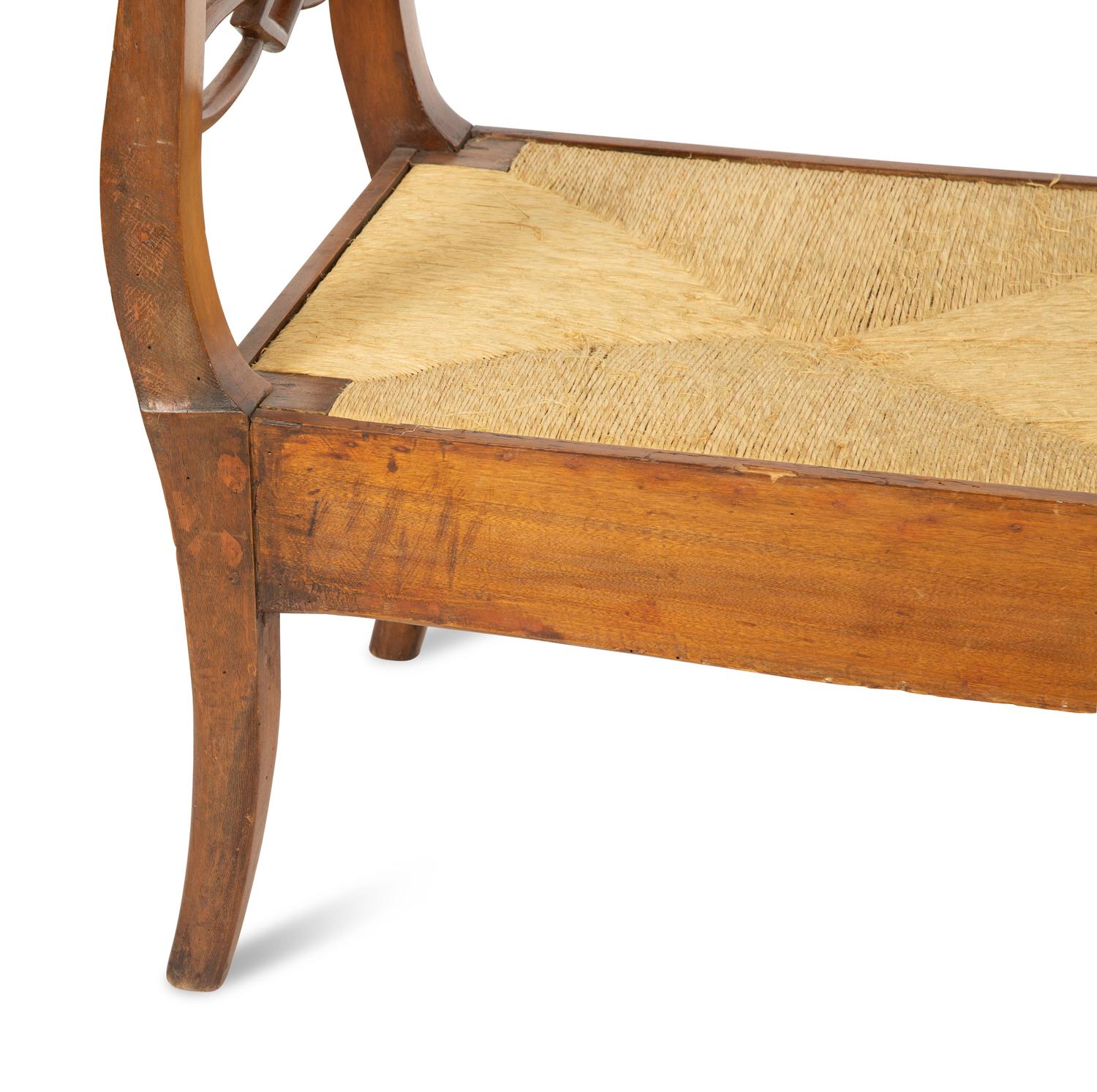 A Northern European Carved Walnut Bench with Rush Seat