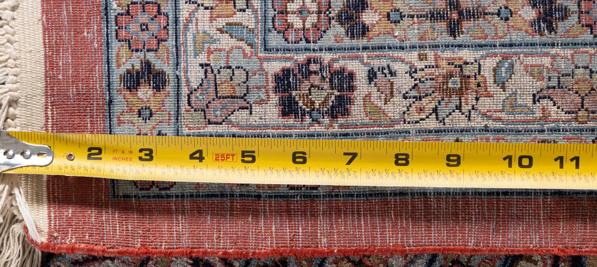 A Qom Wool and Silk Rug