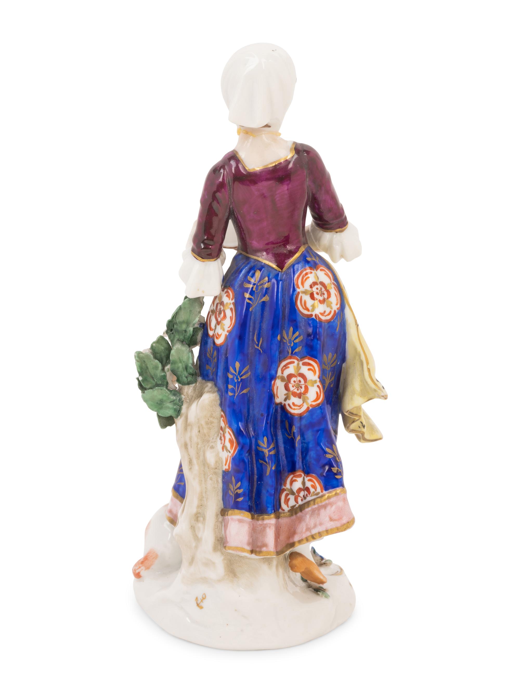 A Chelsea Porcelain Figure