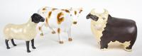 A Glazed Ceramic Figure of a Cow — 20TH CENTURY