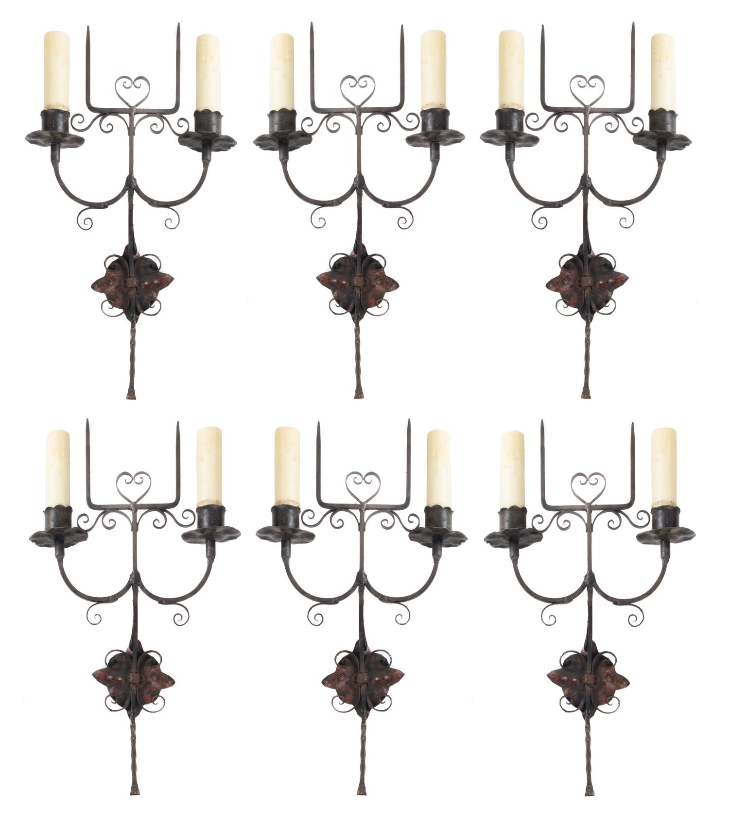 A Set of Six Wrought Metal Two-Light Sconces Height 19 3/4 inches. — STYLE OF ADDISON MIZNER