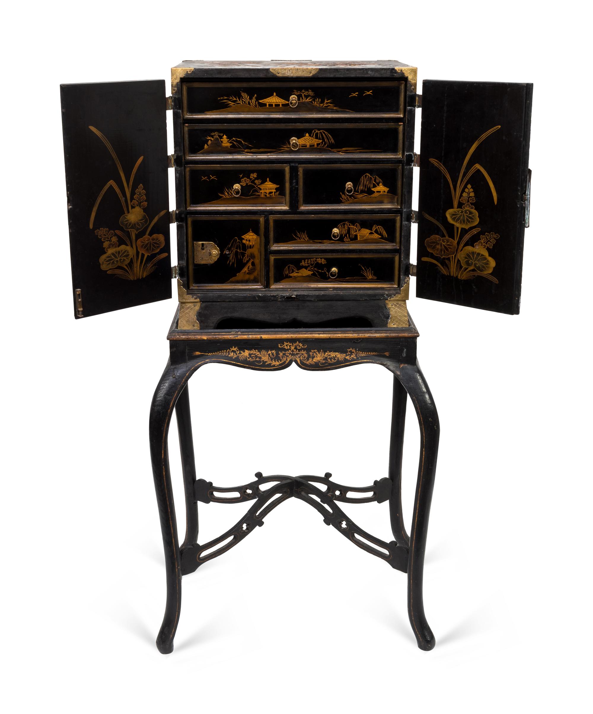 A Japanese Export Gilt Metal Mounted Black and Gilt Lacquer Cabinet on Later Stand — 19TH CENTURY