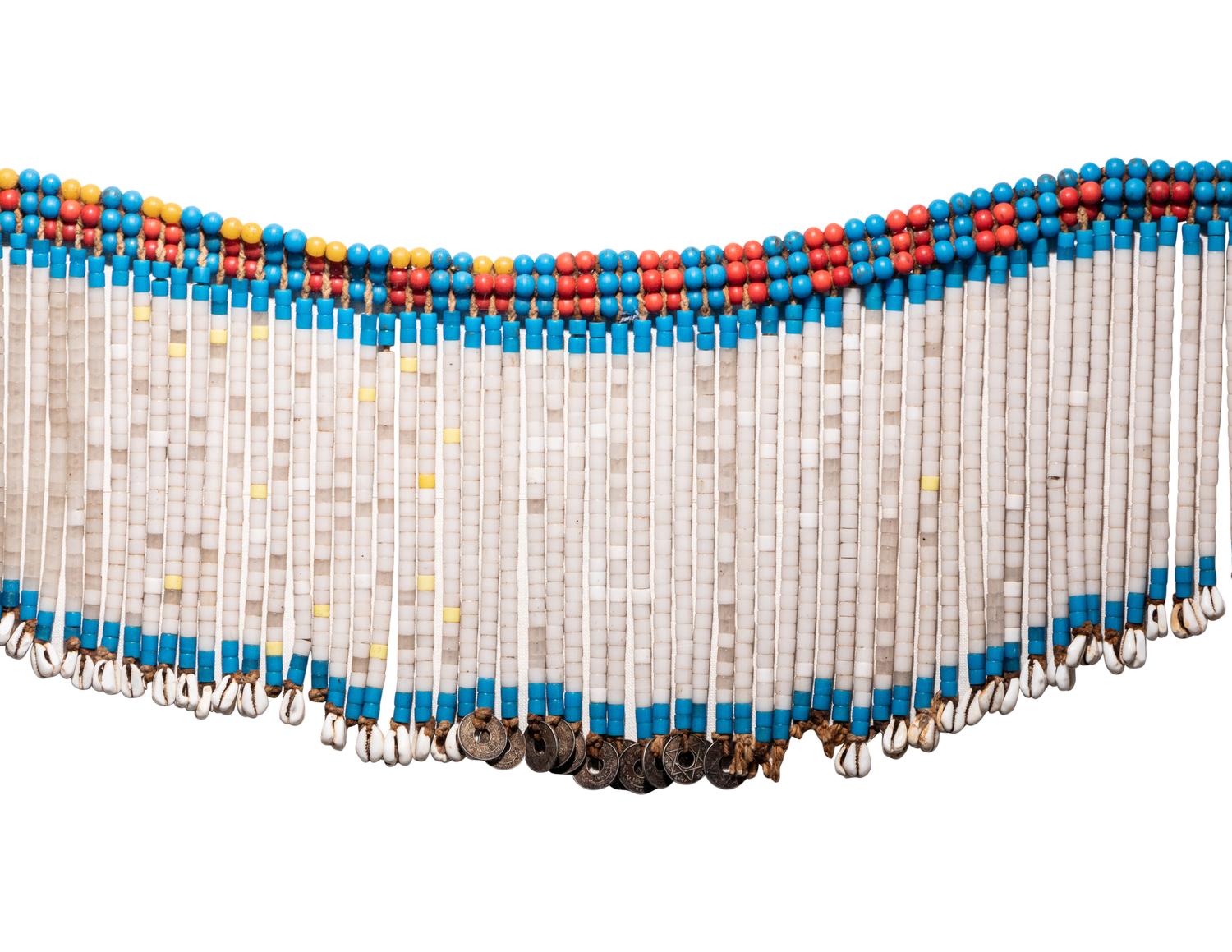 A Group of Four Amazonian Shell Belts or Headdresses