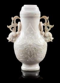 A Jadeite Covered Vase Height 6 1/4 inches. — 20TH CENTURY