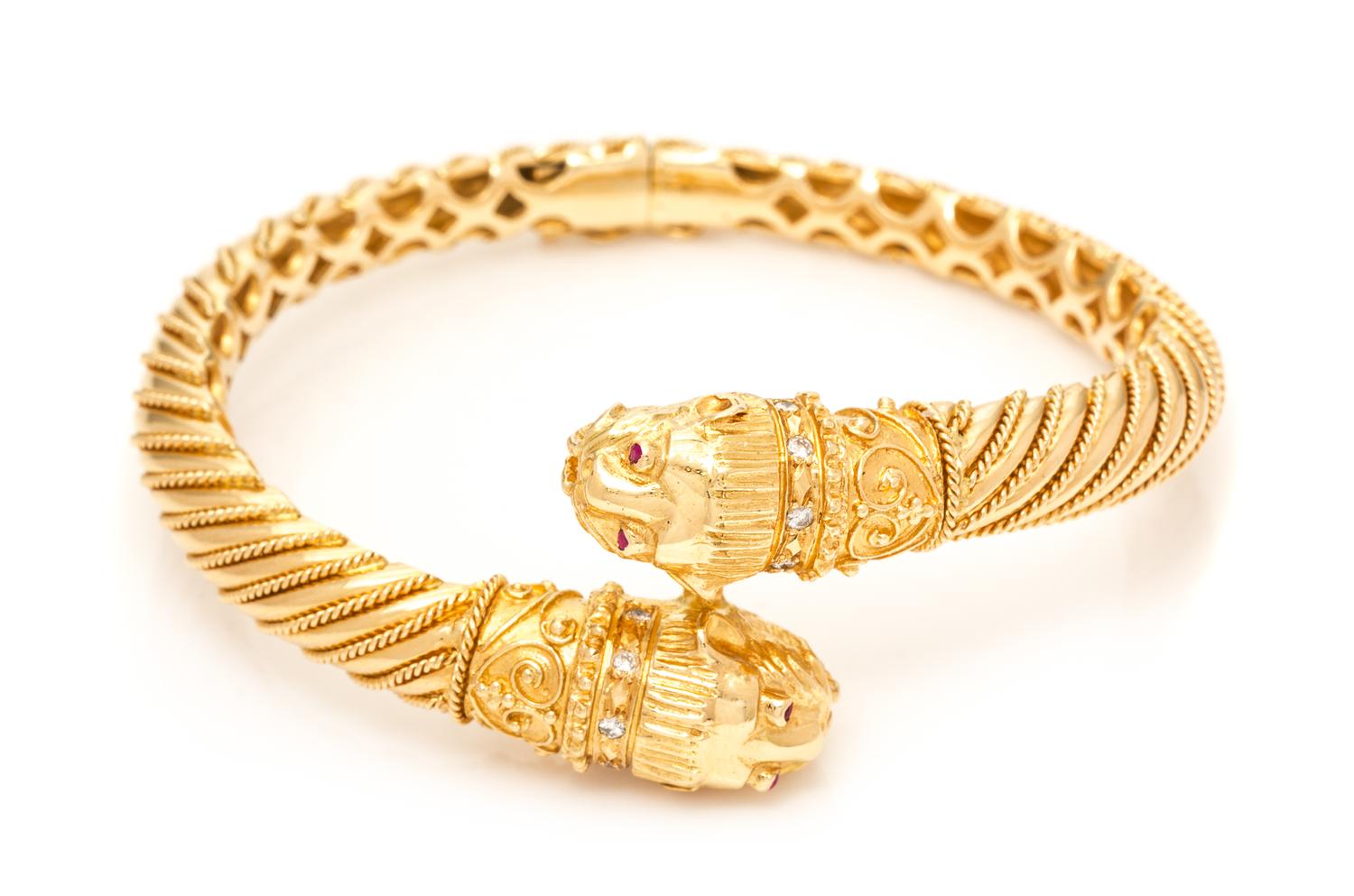 An 18 Karat Yellow Gold, Diamond and Ruby Chimera Bangle Bracelet, Fa Cad'oro, 36.30 dwts.