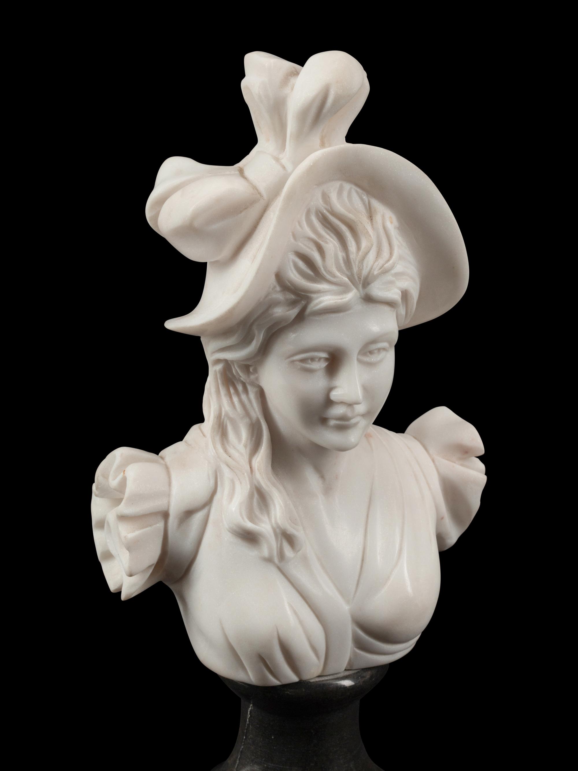 A Set of Four Bi-Color Marble Busts