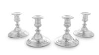 Four American Silver Candlesticks, Gorham Mfg. Co., Providence, RI, having an urn form cup with a knopped stem and a stepped base, weig