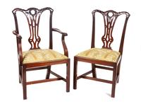 A Set of Twelve English Dining Chairs Height 37 inches. — 20TH CENTURY