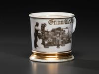 A Photographic Transfer Shaving Mug Depicting a Printer at his Press