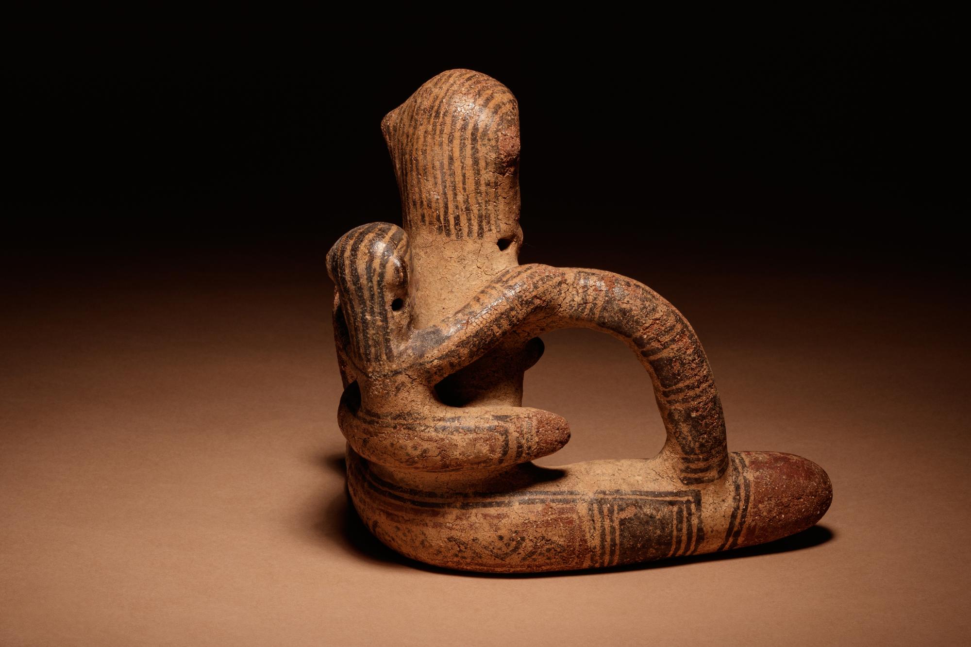 A Nicoya Polychrome Pottery Mother and Child