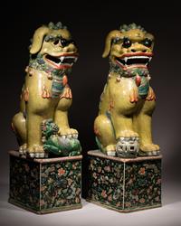 A Large Pair of Chinese Famille Verte Porcelain Figures of Fu Lions