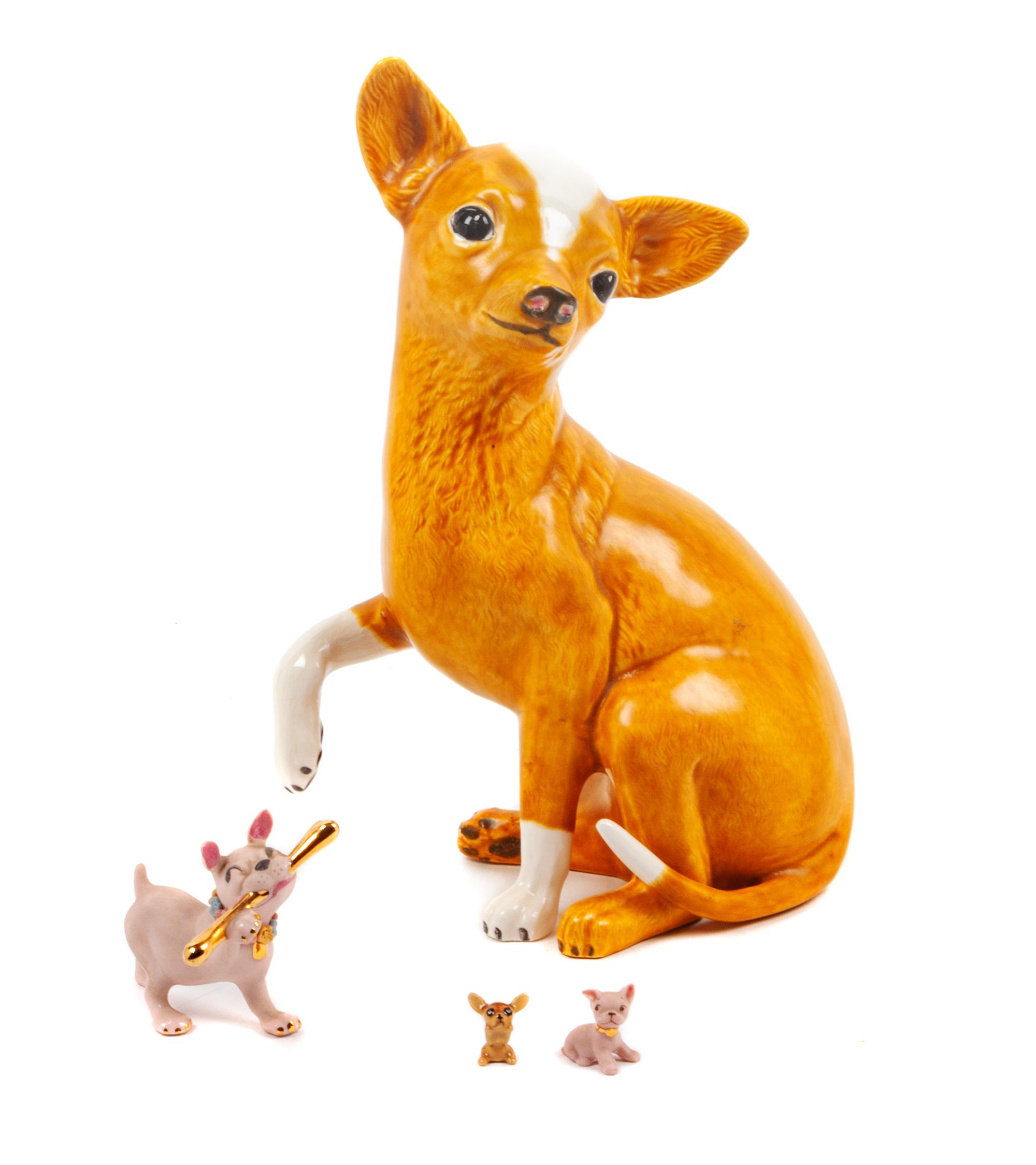 A Group of Four Chihuahuas Height of tallest 10 1/2 inches.