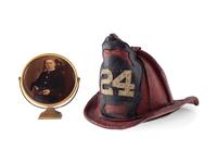 [CALIFORNIA] -- [FIREFIGHTING]. Fire helmet, badges, photographs, and more associated with San Francisco firefighter Ernest Nelson, Engine Co. No. 42, ca 1910-1930s.