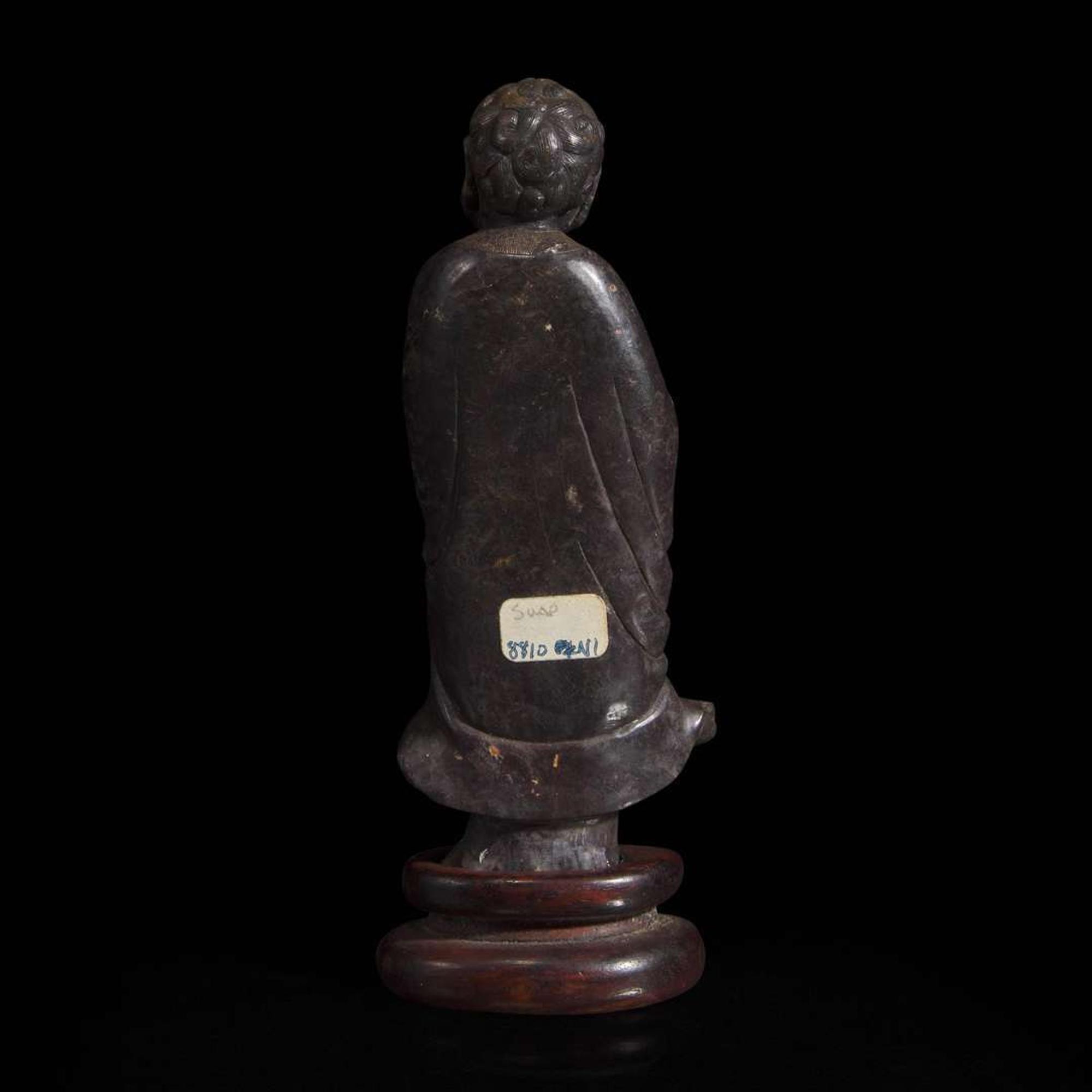 A Chinese carved dark soapstone Luohan 寿山石雕罗汉