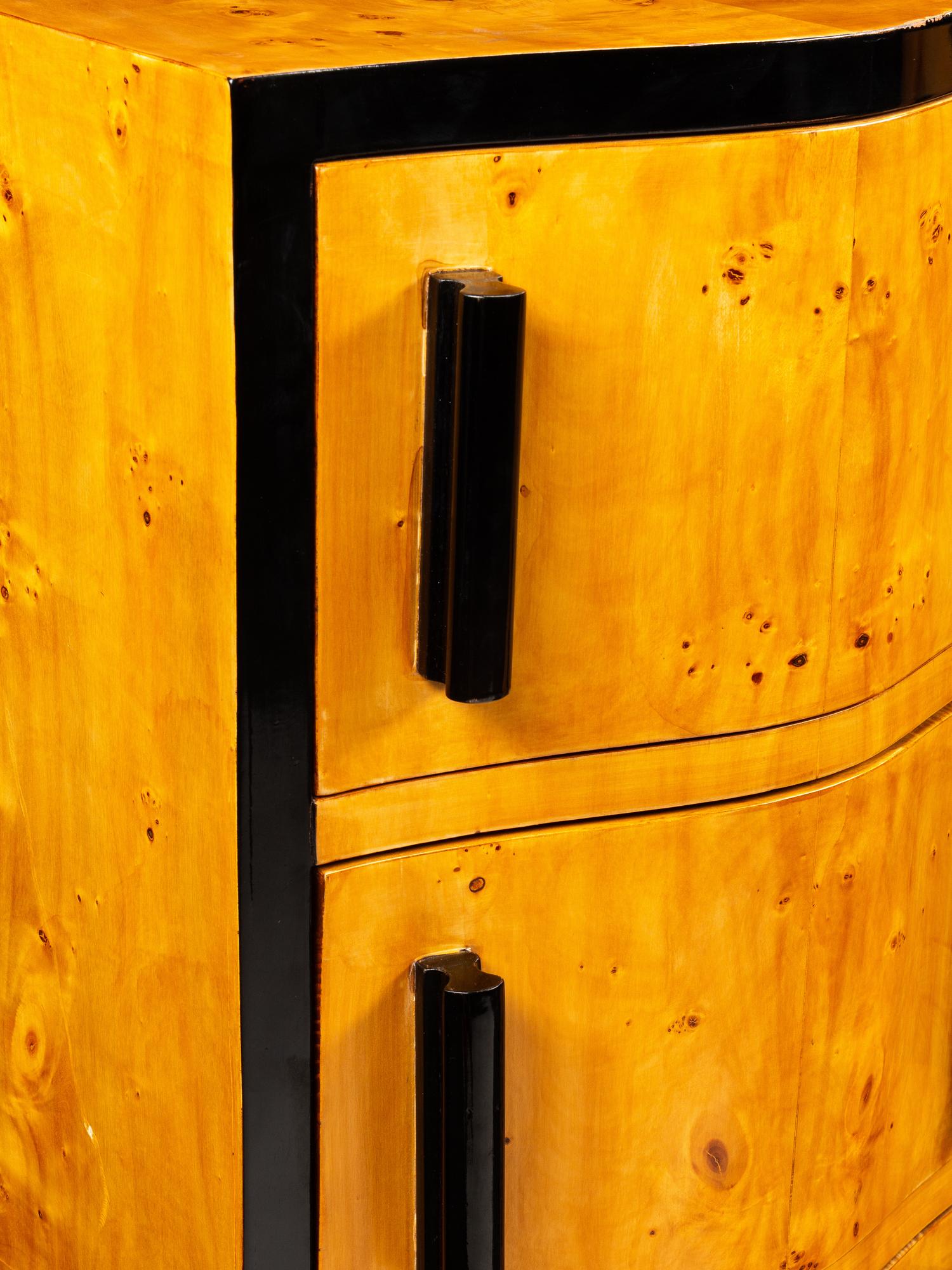 A Pair of Art Deco Style Burlwood and Part Ebonized Tall Chests