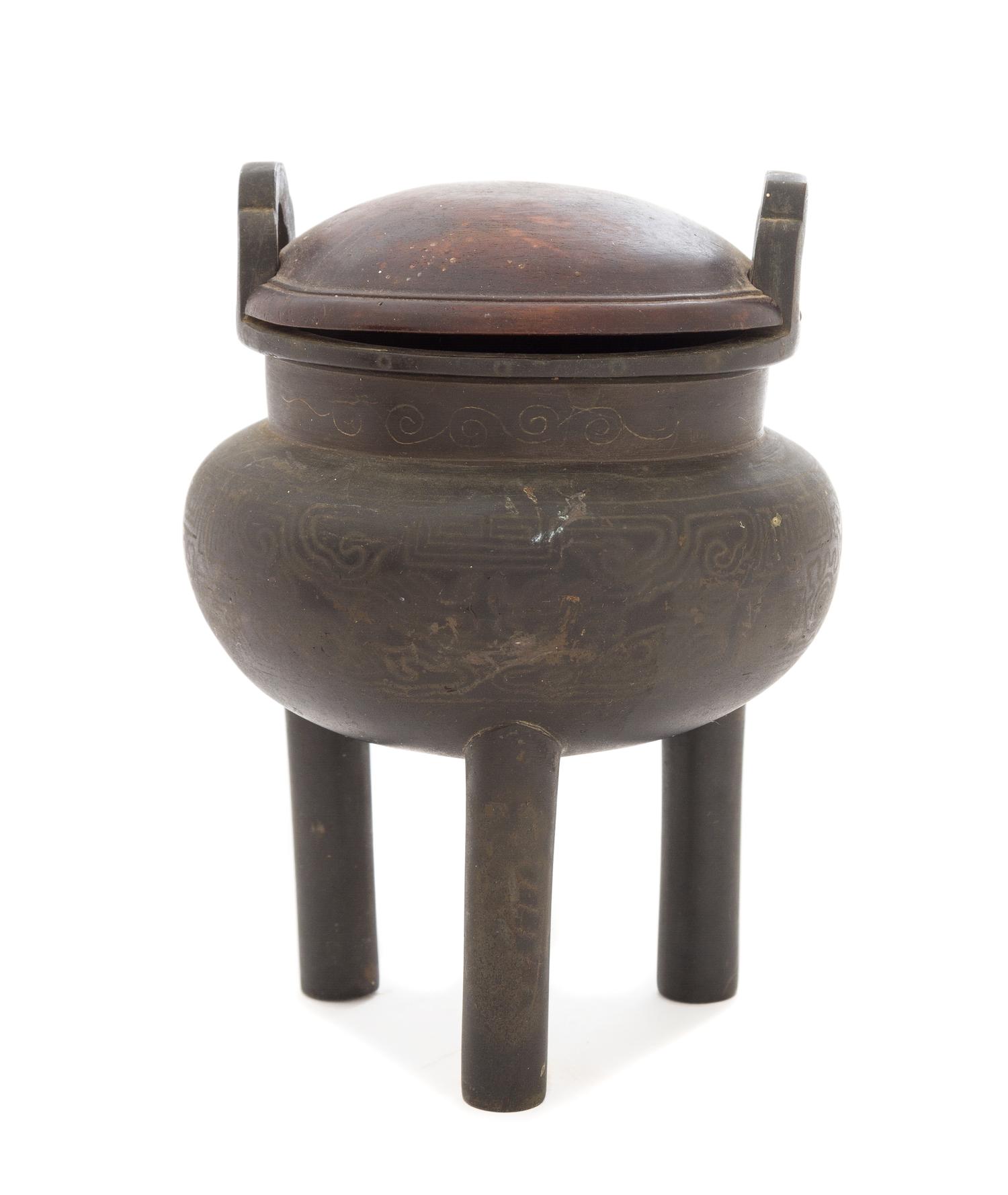 A Bronze Tripod Censer Height overall 5 3/4 inches.