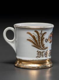 An Optician's Porcelain Occupational Shaving Mug