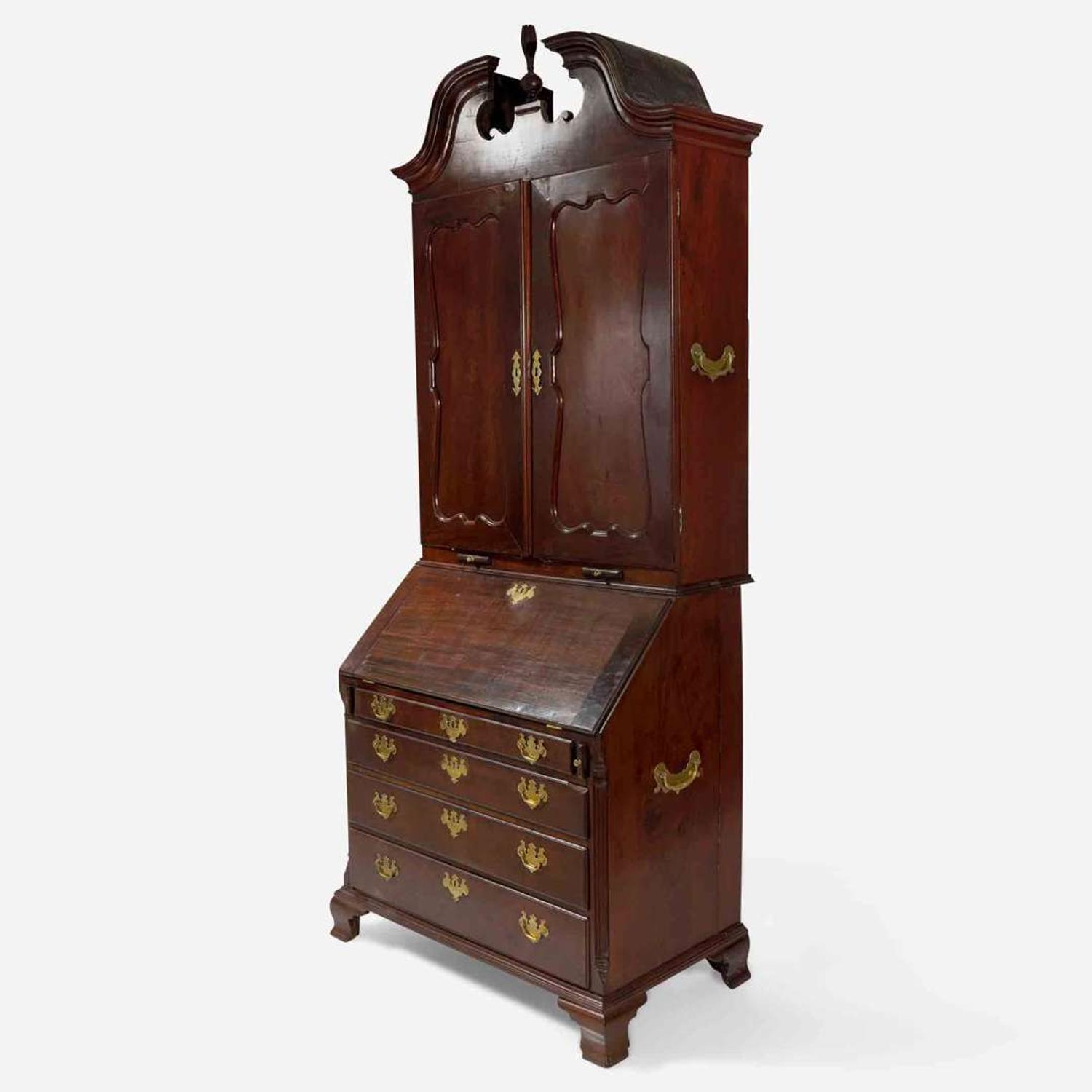 A Chippendale carved mahogany secretary desk and bookcase Possibly Pennsylvania, 18th century with later additions