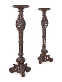 A Pair of Louis XIV Style Carved Oak Torchères