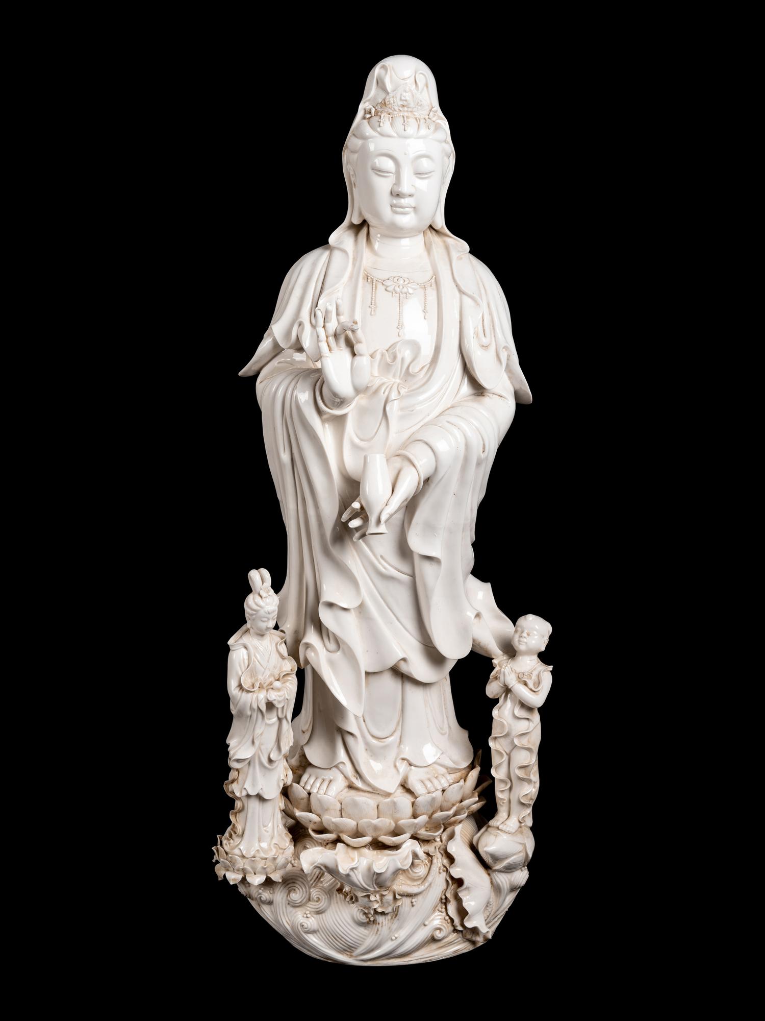 A Monumental Chinese Blanc-de-Chine Porcelain Guanyin Figural Group