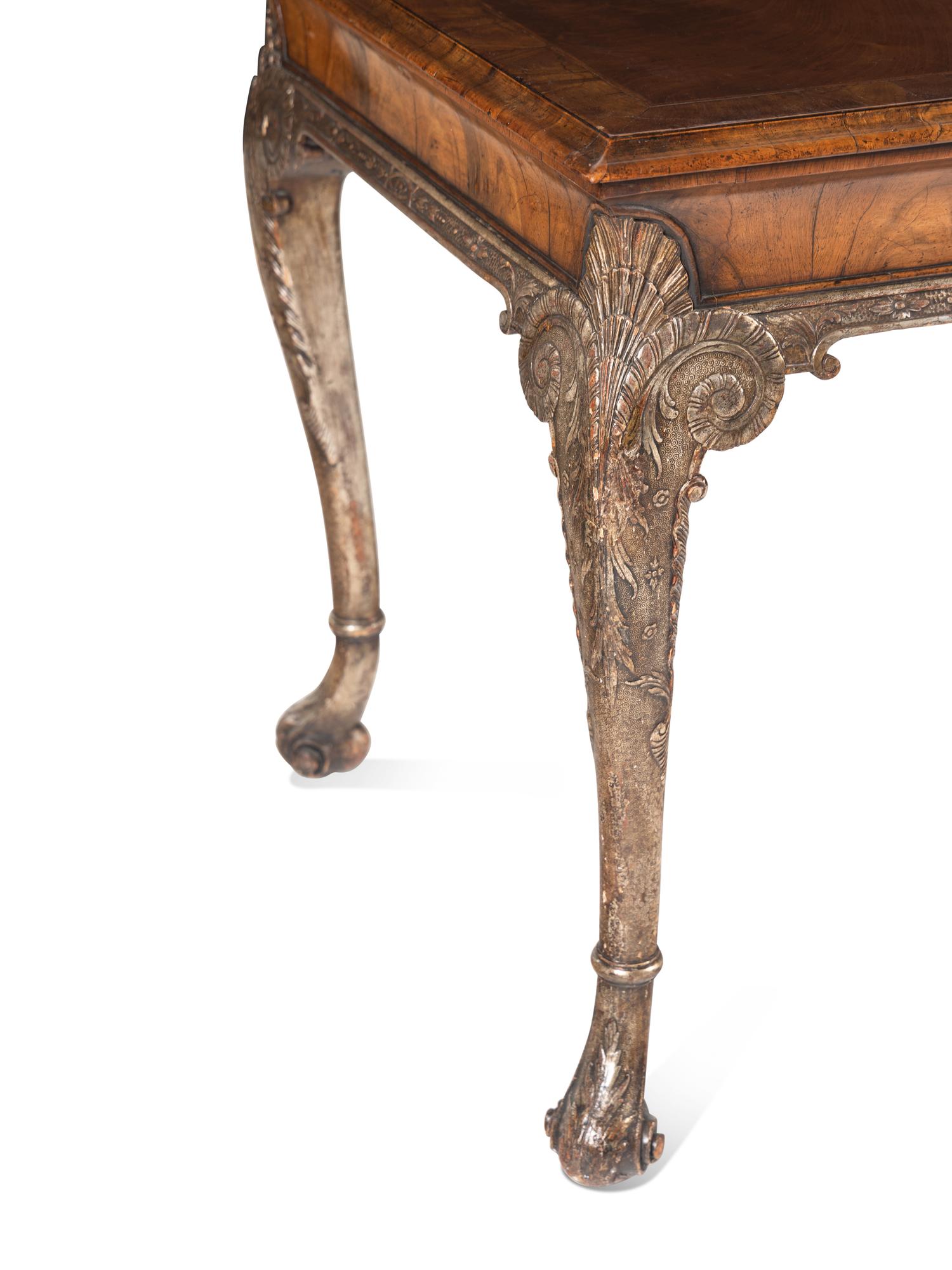A George II Style Parcel-Gilt Walnut Center Table