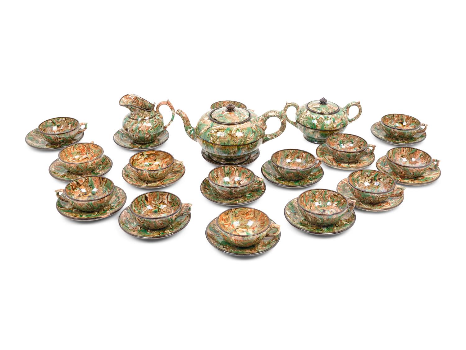 A French Aptware Marbelized Faience Tea Service — 19TH CENTURY