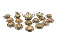 A French Aptware Marbelized Faience Tea Service — 19TH CENTURY
