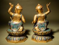 A Pair of Gilt Bronze and Cloisonné Enamel 'Foreigner' Stands