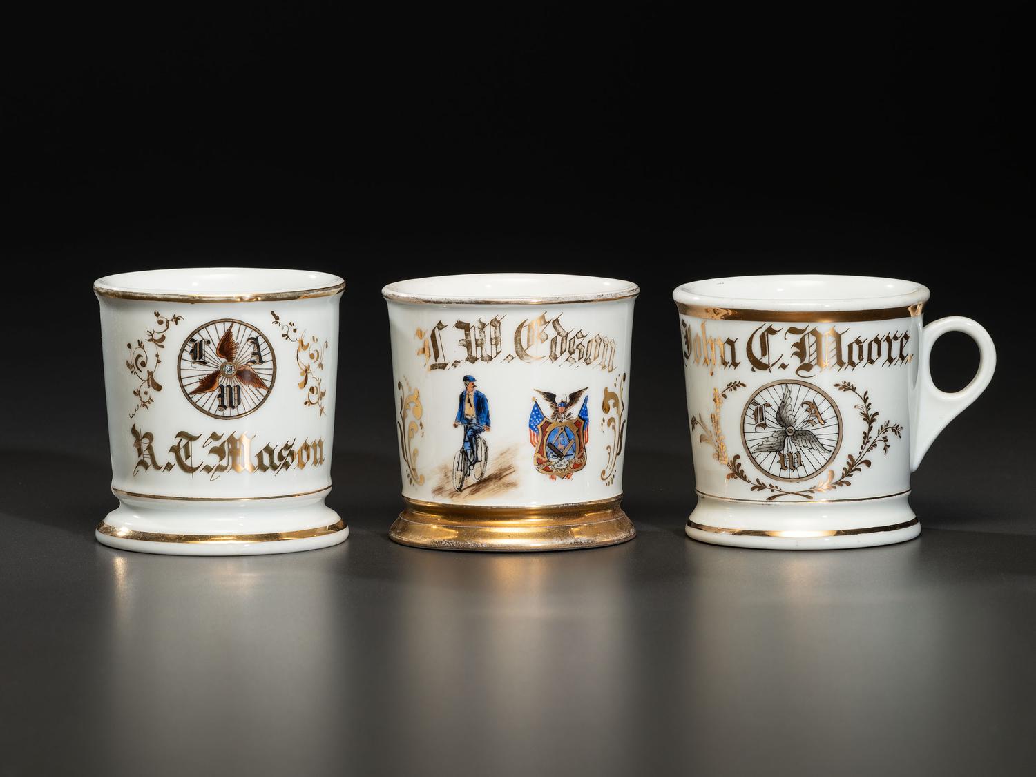 Three Cyclist's Fraternal Porcelain Shaving Mugs