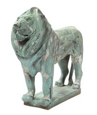 A Bronze Figure of a Standing Lion Height 25 1/2 x length 31 x width 11 inches. — 20TH CENTURY