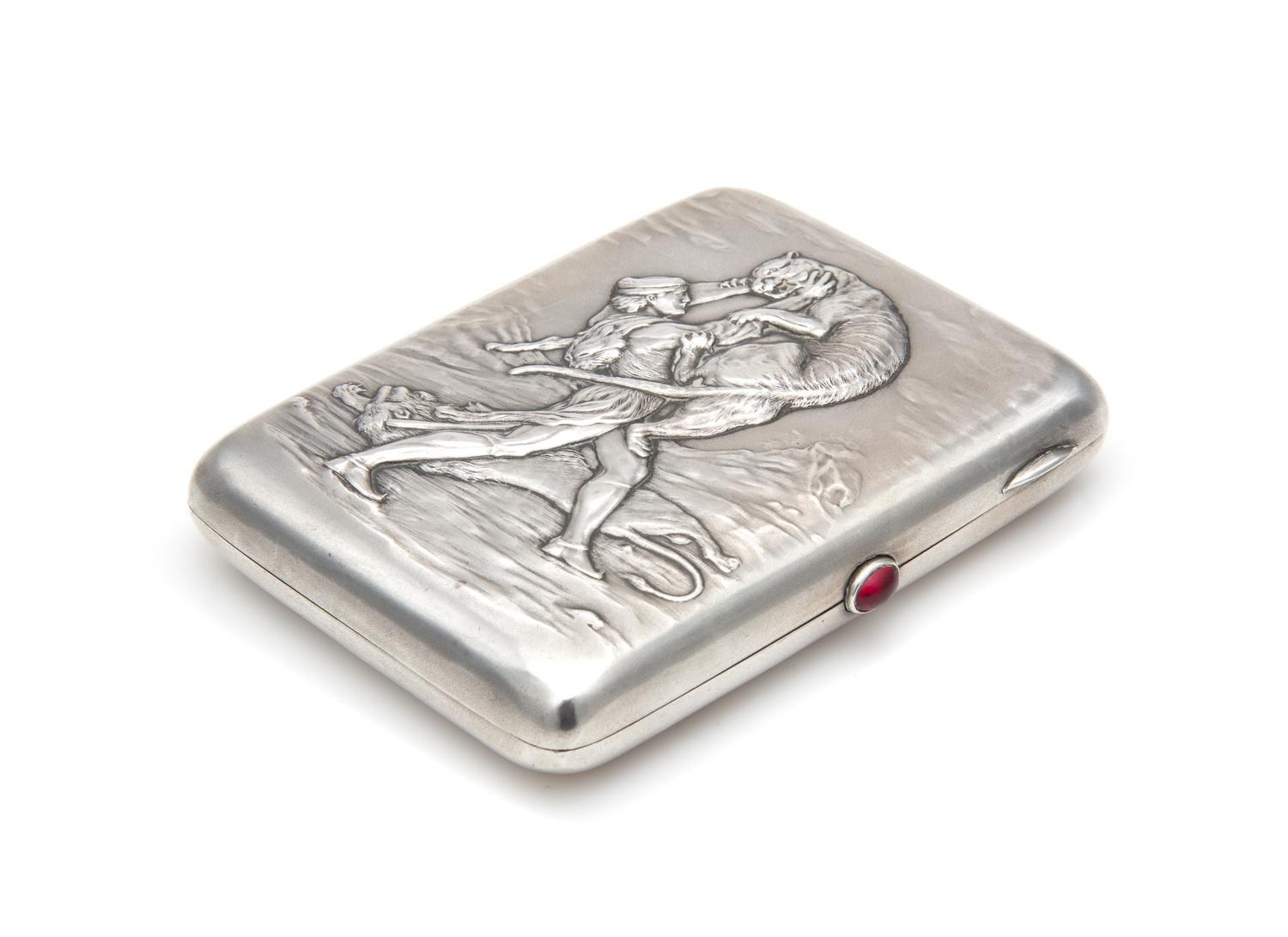 A Soviet-Era Russian Silver Cigarette Case, Maker's Mark Cyrillic AMYu4, Moscow, 20th Century, the lid worked to show a warrior battlin
