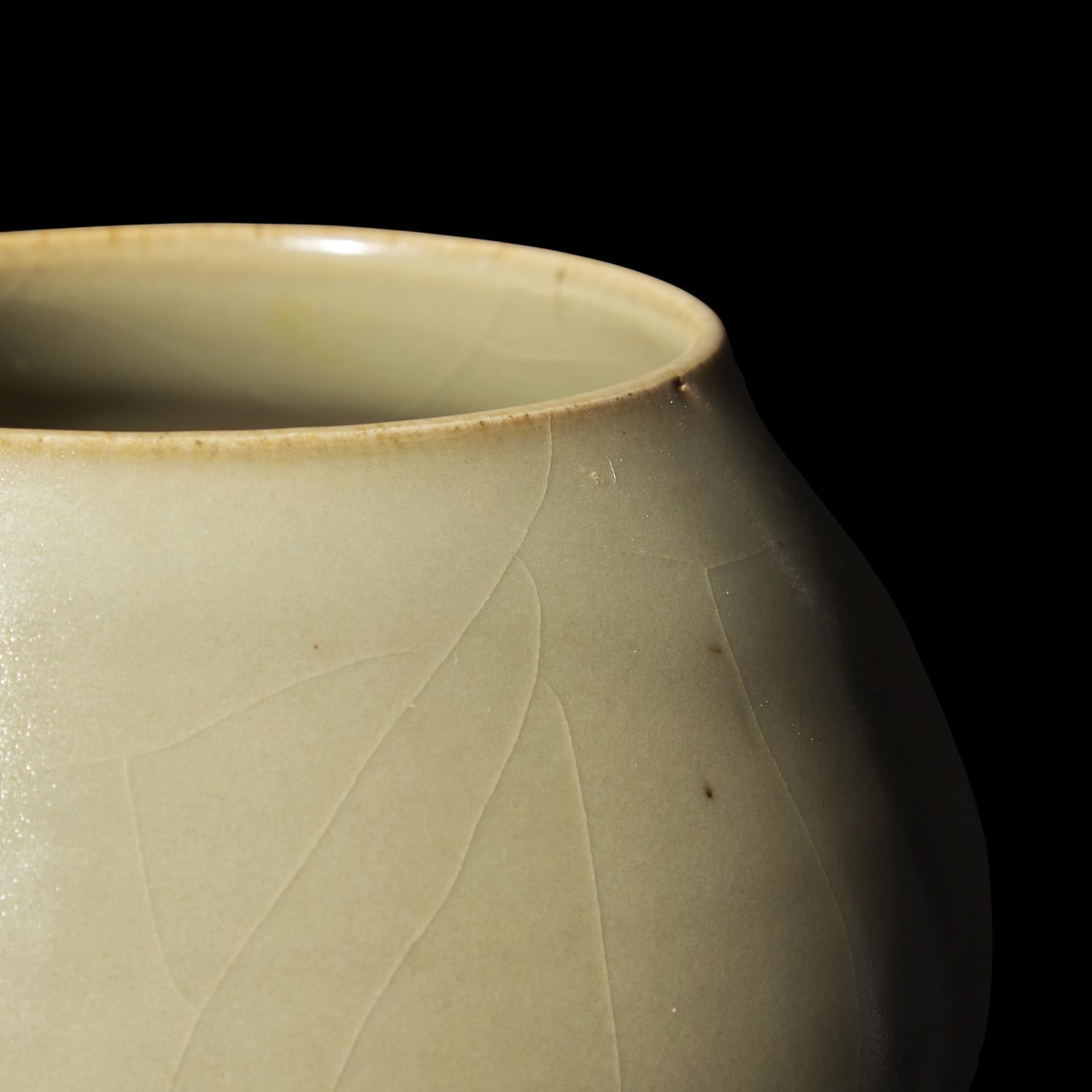 A Chinese Green-Glazed 'Lotus Bud' Vessel, Junyao or Ruzhou Donggou Kilns, Jin Dynasty 金 鈞窯或汝洲東溝窰綠釉鷄心罐