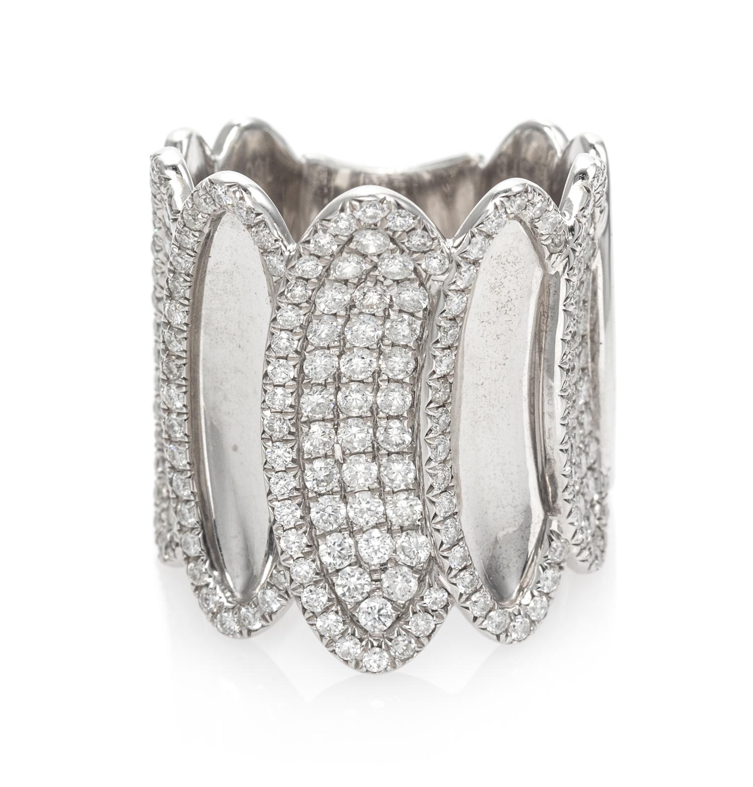 An 18 Karat White Gold and Diamond Band Ring, House of Baguettes, 10.90 dwts.