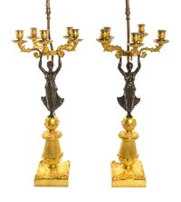A Pair of Empire Gilt and Patinated Bronze Five-Light Figural Candelabra, Height 22 3/4 inches.