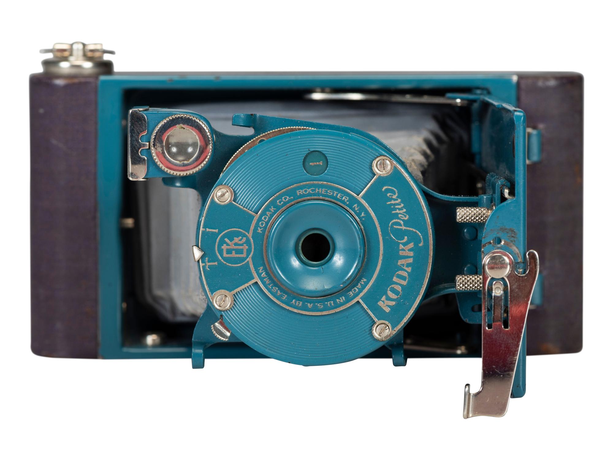 [EARLY PHOTOGRAPHY]. Two Kodak Petite Cameras, one with original vanity case.