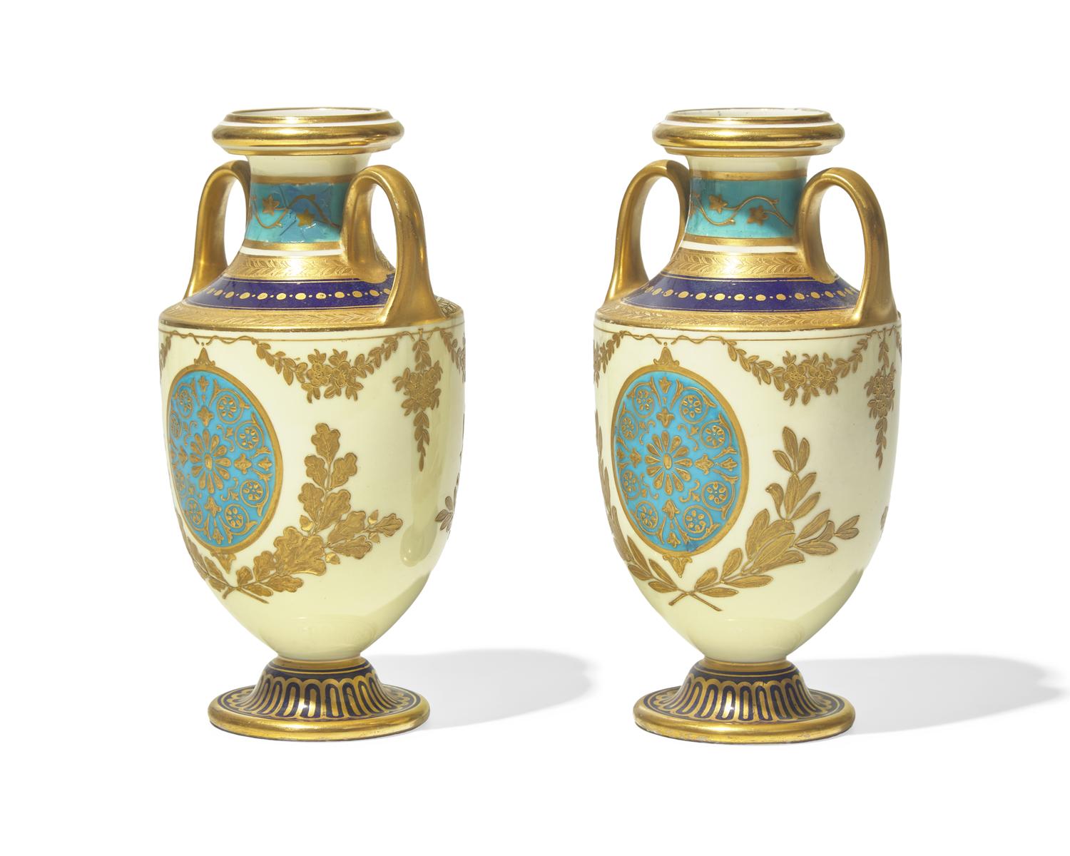 A Pair of English Gilt Decorated Porcelain Urns
