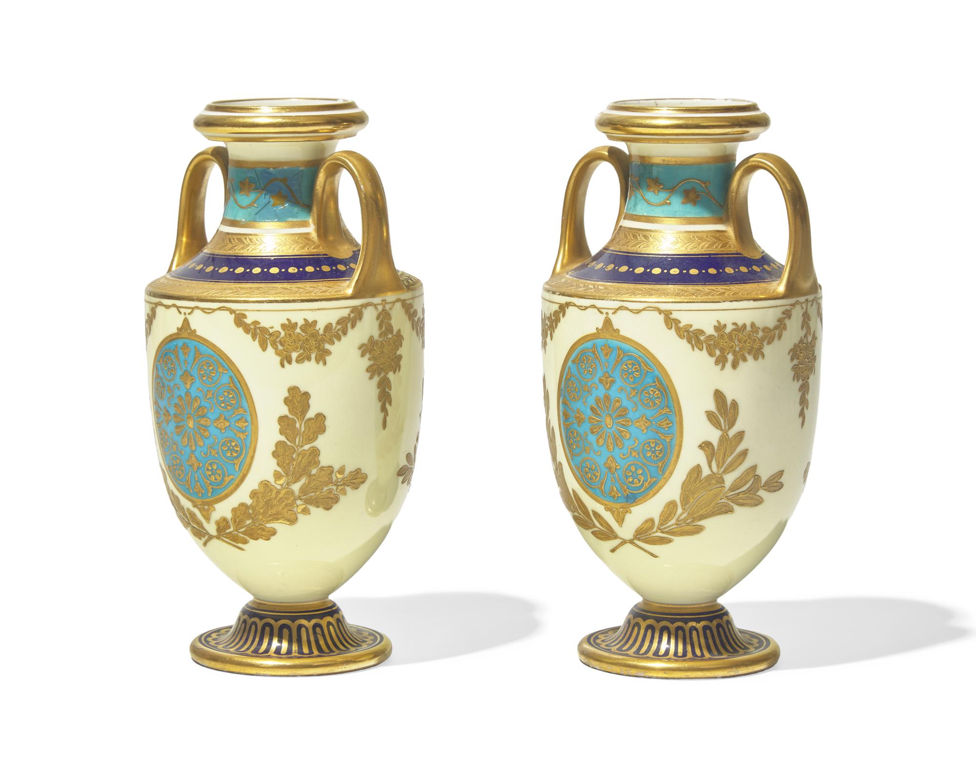 A Pair of English Gilt Decorated Porcelain Urns