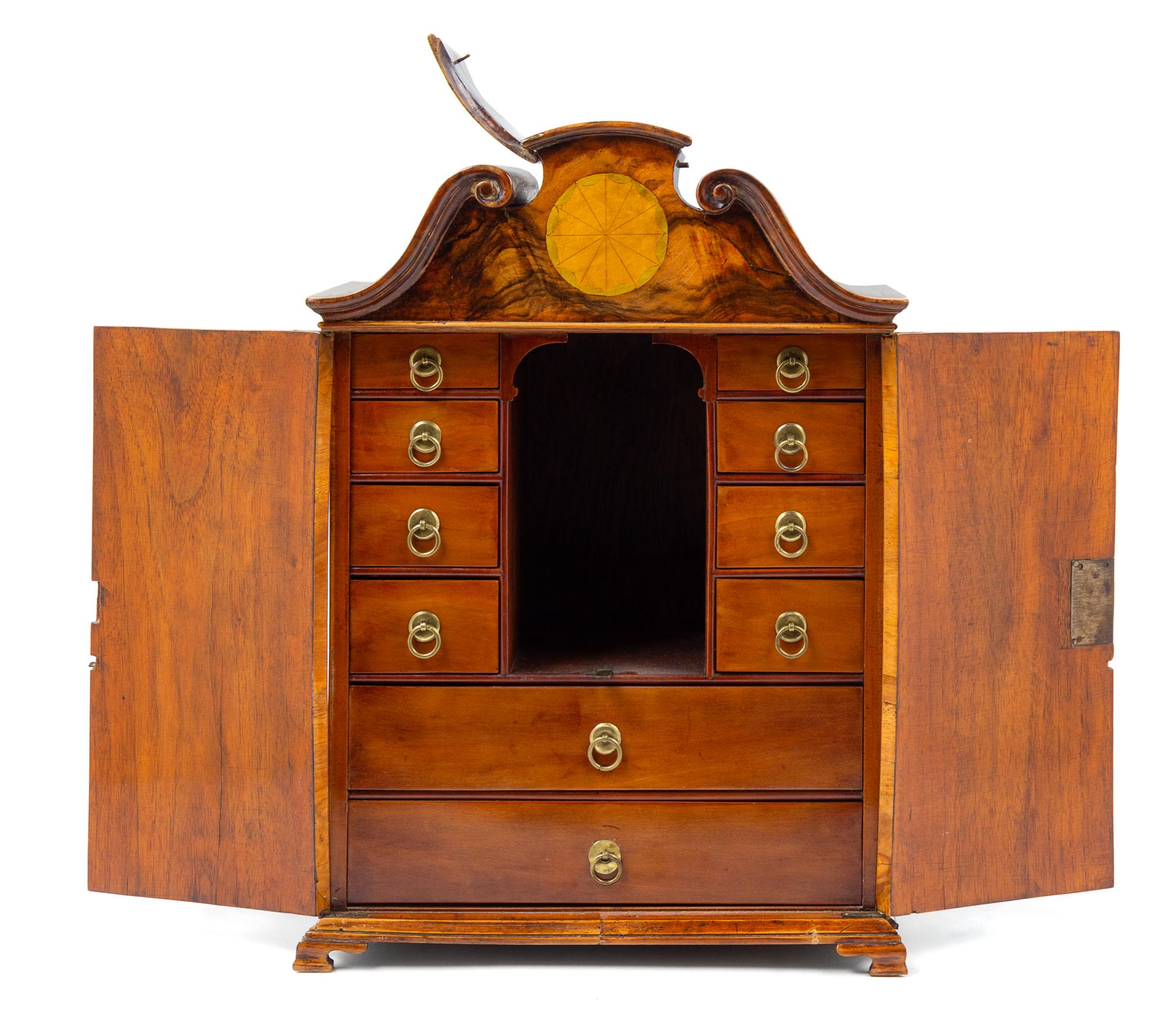 A Diminutive Continental Walnut Cabinet Height 16 1/2 inches. — 19TH CENTURY