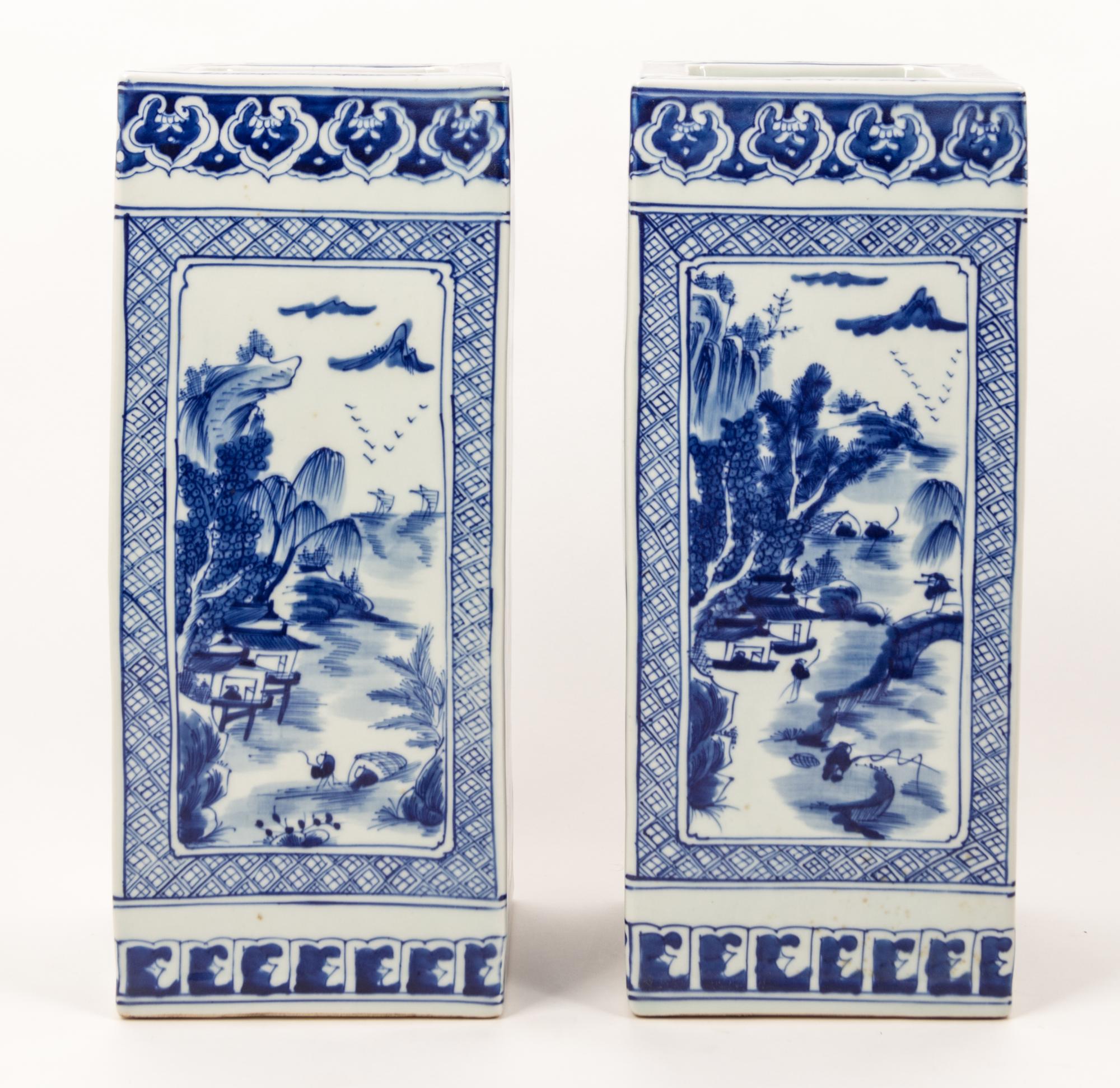 A Pair of Chinese Blue and White Porcelain Vases Height 14 inches. — 20TH CENTURY