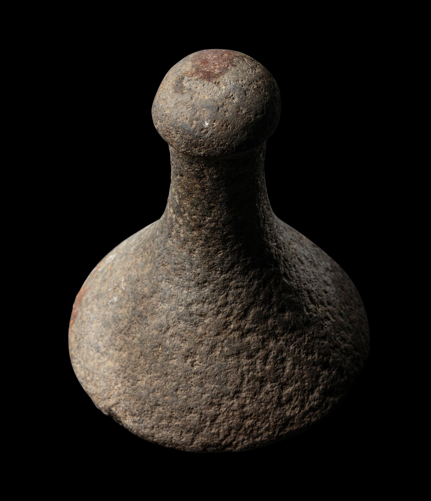 A Tahitian Basalt Poi Pounder